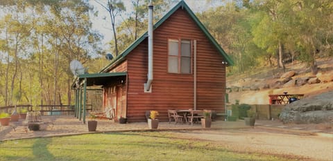 Our cabin with several outdoor seating options