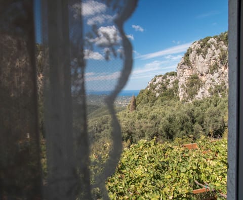 the view of Castelli rock from the purple bedroom.