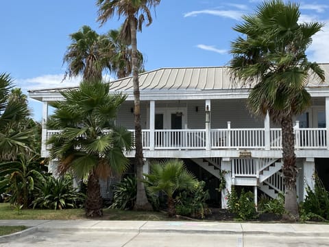 Key West style house has two private upstairs vacation units.