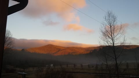 Mountain view towards the Blue Ridge Parkway from the cabin at sunset..