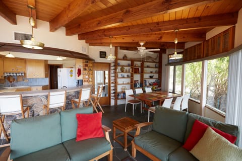 Living Room and Dining table, partial kitchen