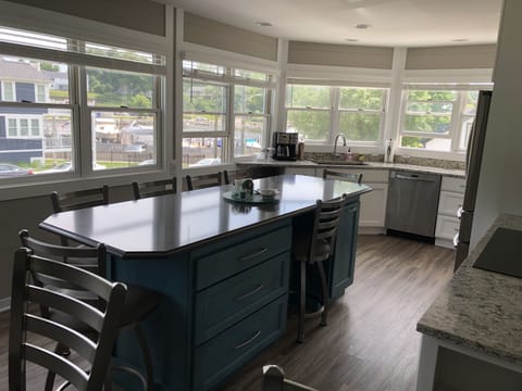 Newly renovated kitchen with large eating/dining island.