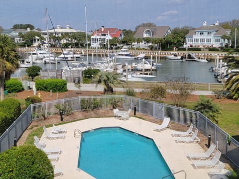 View from Condo. Yachts and Sailboats at Isle of Palms Marina. 