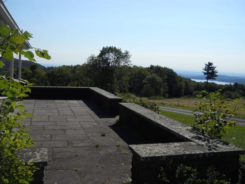 Stone patio provides stunning views, a great hang out spot with hammock, chairs.