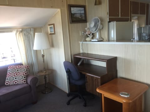 Couch turns into a second bed. Desk and fan are available.