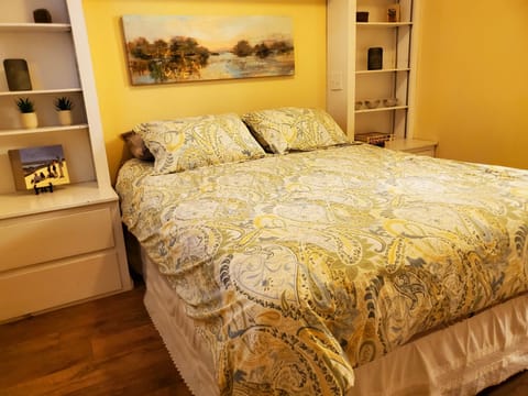 Downstairs bedroom queen bed