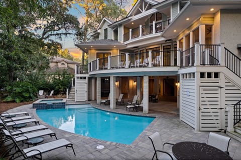 Back of the house. Pool and spa (heated for a fee).