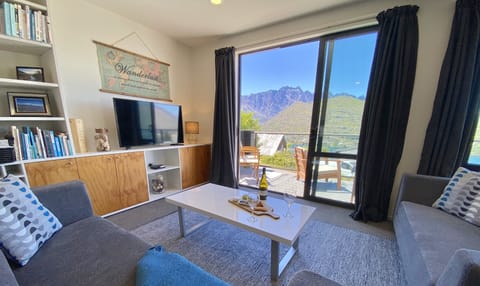 Lounge: Smart TV + live TV, log in to streaming apps, lake + Remarkables views