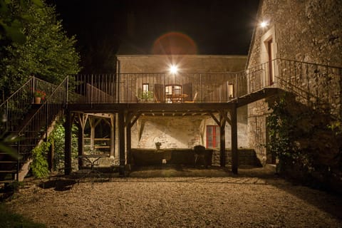 Rix mill cottage with the terrace overlooking the mill stream and the lake