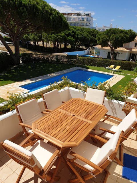 Balcony Ground floor, swimming pool and garden view