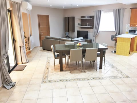Combined living/dining/kitchen area
