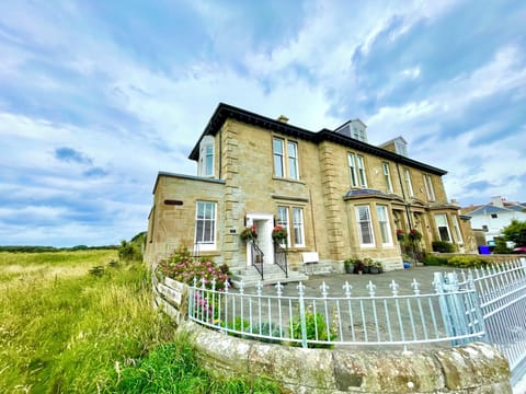 Spacious garden villa with enclosed driveway and private South facing garden.