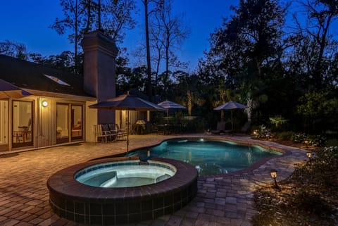 Private swimming pool at night.