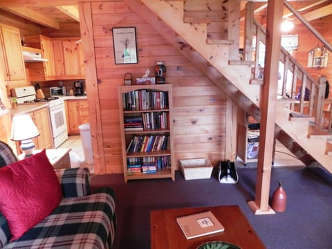 Living room and stairs up to loft master bedroom and sitting area