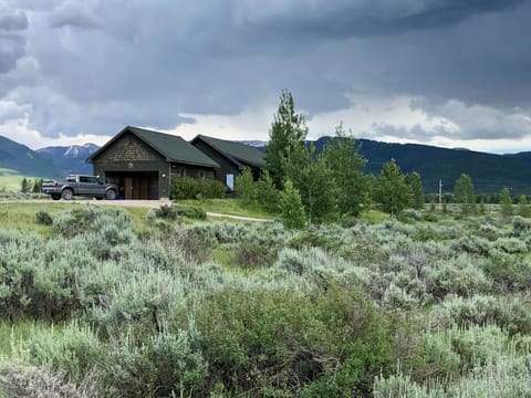 This homes sits on 5 acres with spectacular views and plenty of privacy.