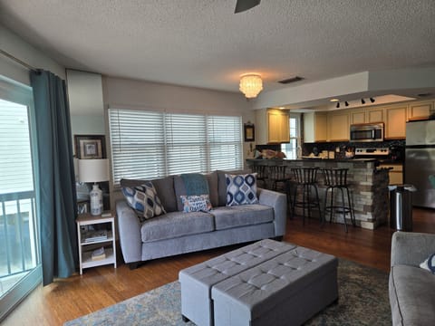 Open concept living, kitchen, dining space