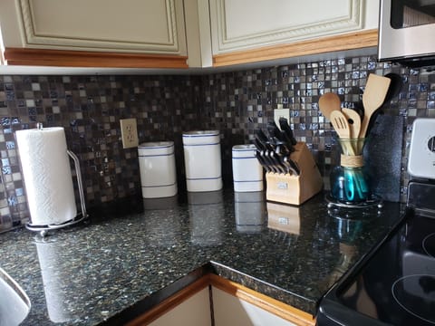 The kitchen has all the necessary items to cook a great meal.