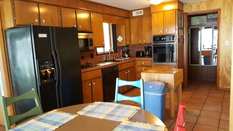The kitchen is well-stocked and provides plenty of room for preparing meals.