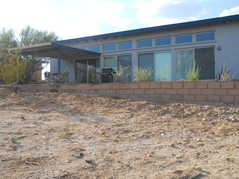 Rear View with Patio and Fire-pit Area