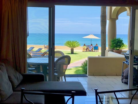 View from inside condo towards pool/ocean