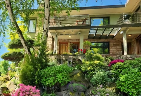 Front Of Seattle Luxury Suites Building. Lush Landscaping