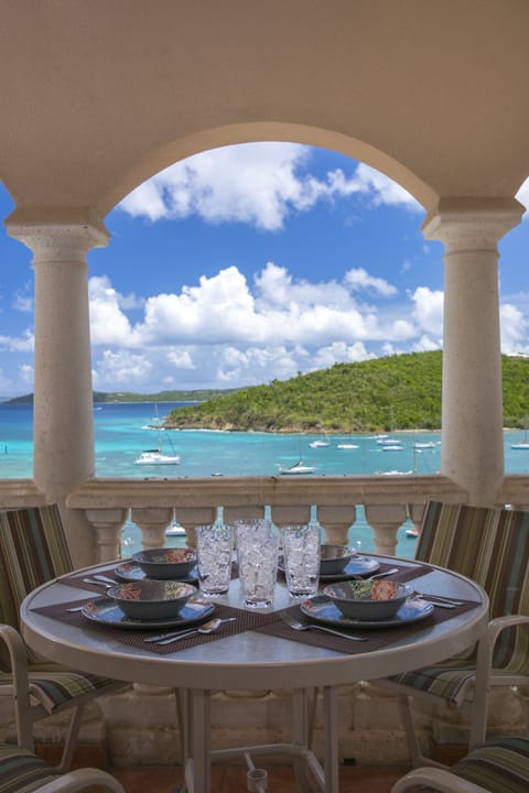 Outdoor dining on the balcony with that view!