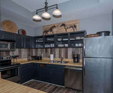 Kitchen with everything you need for cooking and serving