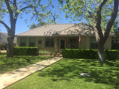 Front photo of house. In quiet neighborhood. Cozy , comfortable, close to all!