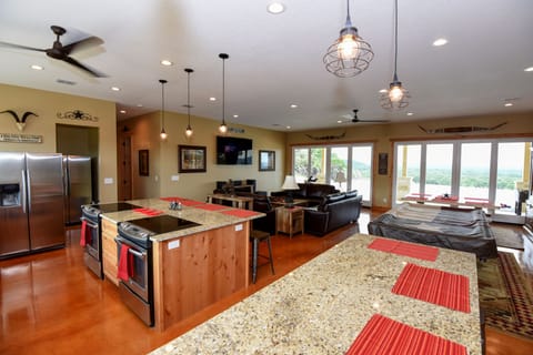 Kitchen has 2 stoves, refrigs, mircrowaves, W/D etc..  Just bring your food.