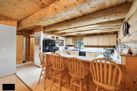 The kitchen has ample room for a large group to prep meals and cook together.