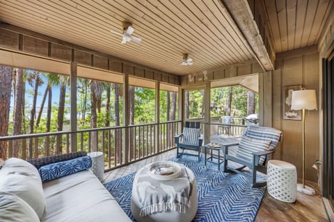 Relax in the screened porch