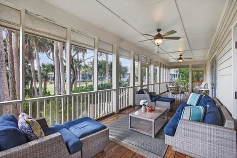 Enjoy the amazing screened porch with golf views