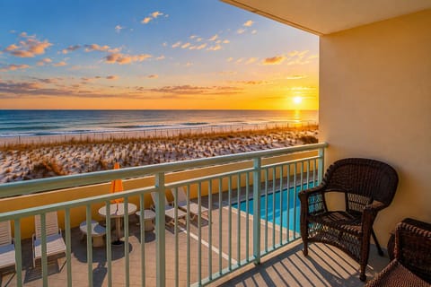 Private balcony with an awesome beach view, ideal for sunrise, sunset, and dolphin watching.