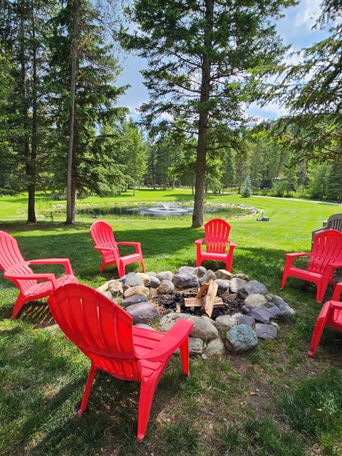 Gather ‘round the Firepit – Adirondack Chairs, Pond Views & Peaceful Pines