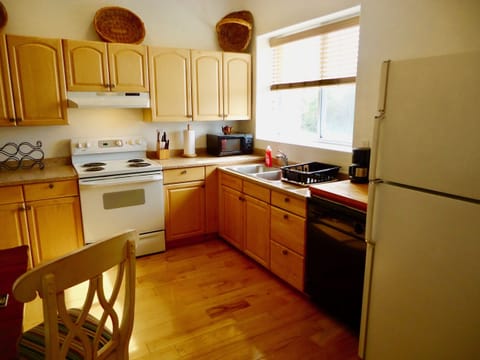 Kitchen looking east to sunrise over the bay.