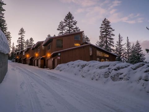 Winter. Corner unit with floor to ceiling windows. Trail to Canyon lodge at top.