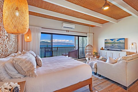 Oceanfront King - Sleep soundly in a plush king-sized bed with the sound of waves as your lullaby.
