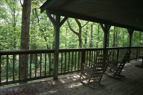 Rocking chairs and picnic table for your enjoyment of the mountainous view. 
