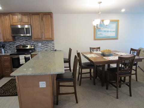 New dining room, table for six. Also bar stool/chairs.