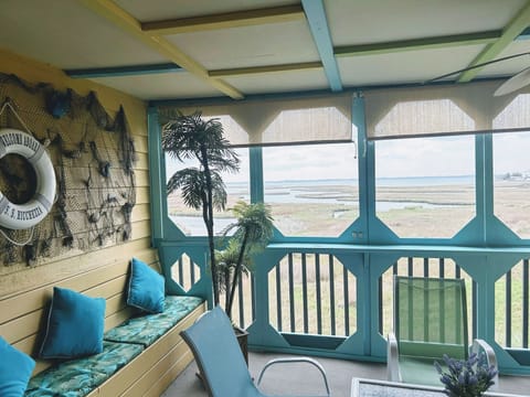 Caribbean style back deck overlooking bay