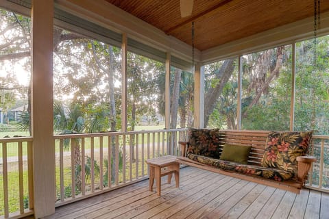 Relax and swing on the screened porch!