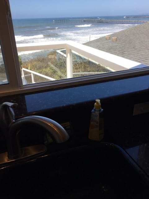 WHAAAT?  Are you STILL doing dishes?  Or are you mesmerized by the view?