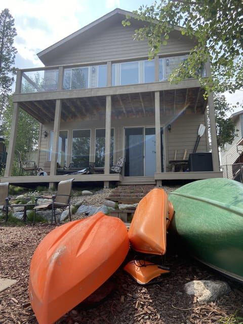 Newly painted in 2021, view lower and upper decks from lake side.