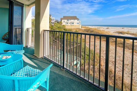 Welcome to paradise on the beach!  Oceanfront balcony.  Enjoy a drink while watching the waves.