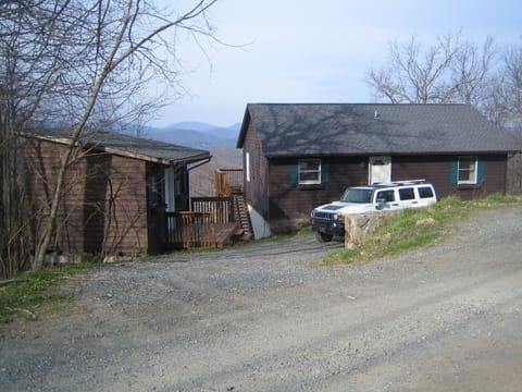 Cabin with utility building to store ski equipment or sleds