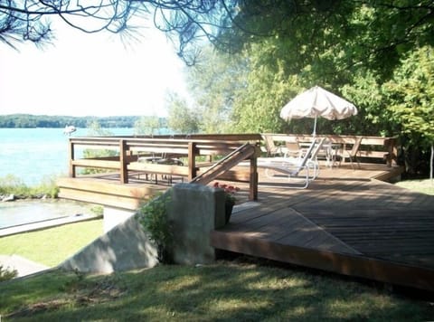 Sunny deck viewing onto Lake Leelanau. Great Sunsets. All day sun!