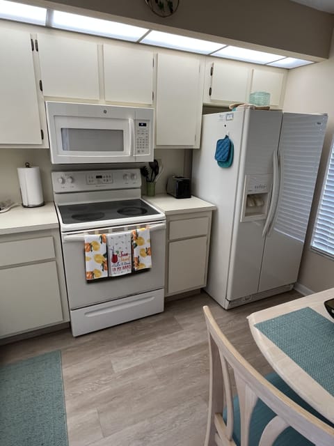 Kitchen with Side by side frig with ice & water dispenser 