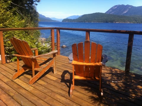 Living room as seen from kitchen. View of Sechelt Inlet.