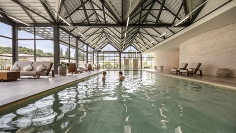Indoor pool, sun loungers