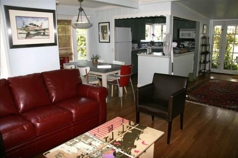 Living room, dining room and kitchen area